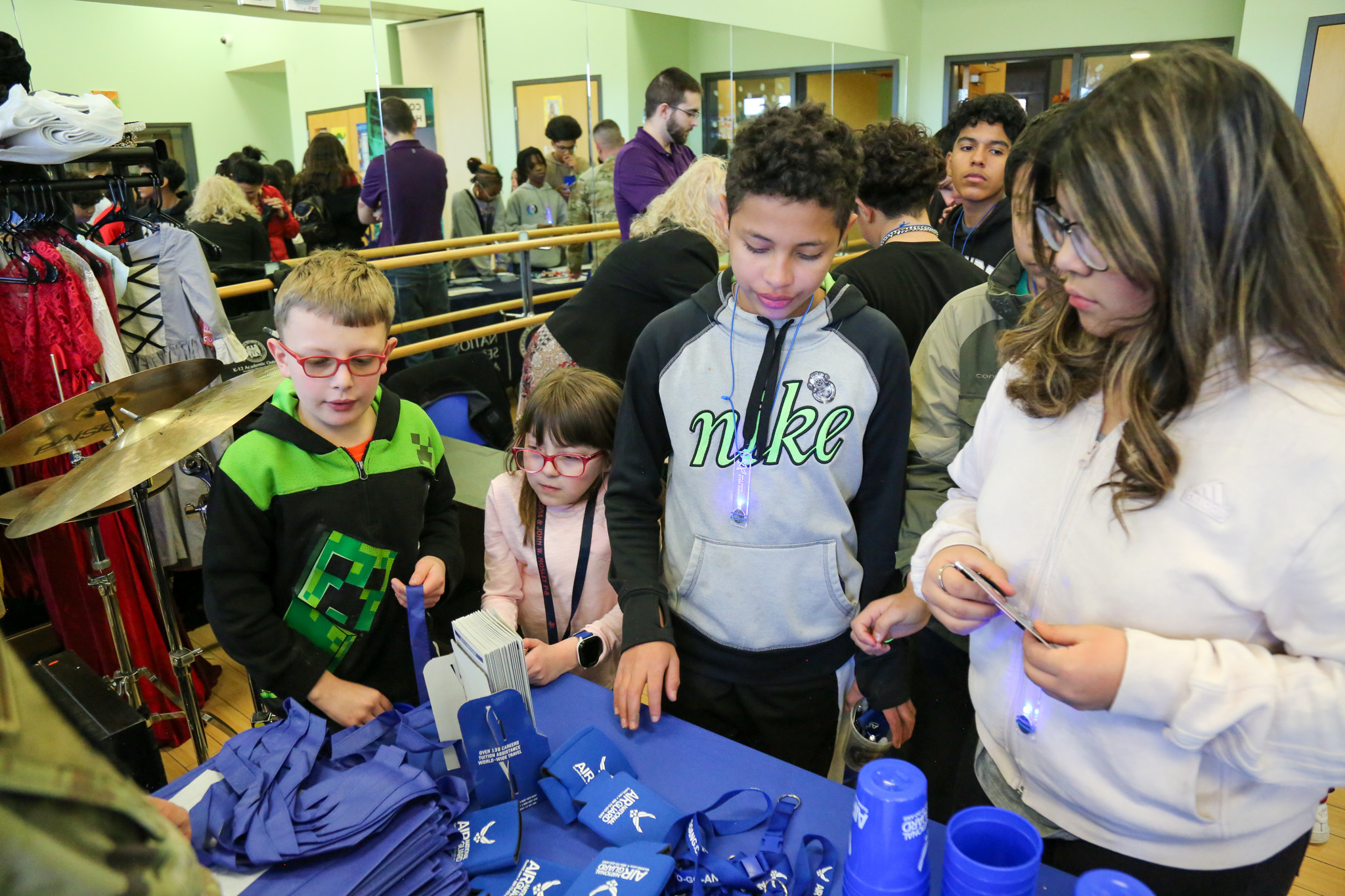 Middle school students participate during Buckley Space Day at an Air Force table